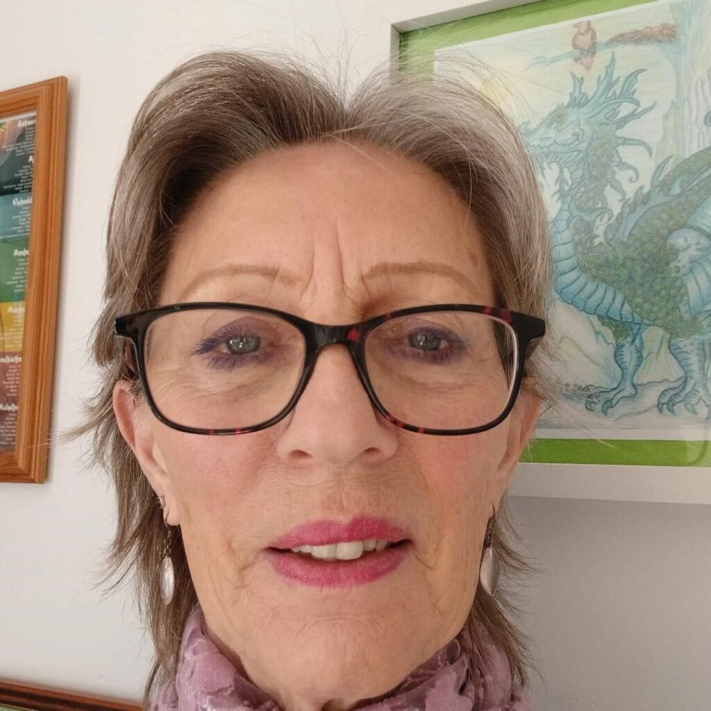 Portrait photo of the practitioner behind Tarka Wellbeing and Spinal Flow Practice